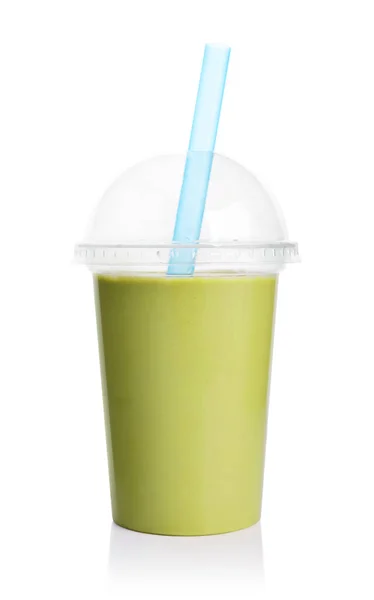 Green smoothie in plastic transparent cup — Stock Photo, Image