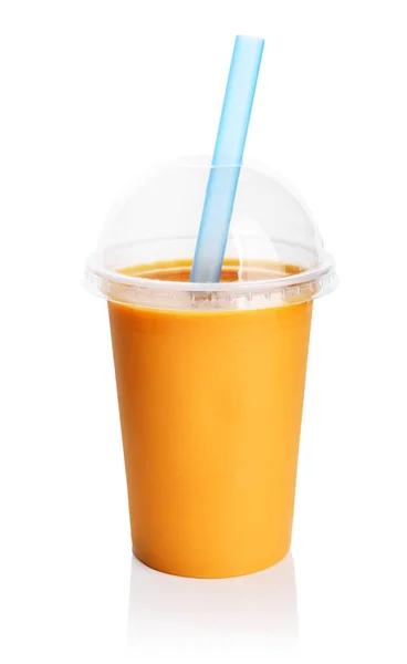 Orange smoothie in plastic transparent cup — Stock Photo, Image