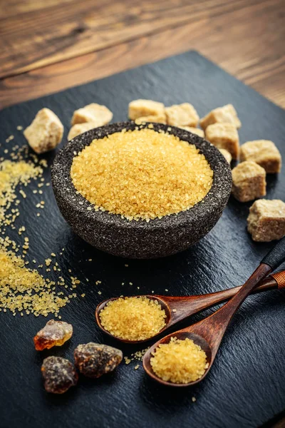 Brown cane sugar in bowl — Stock Photo, Image