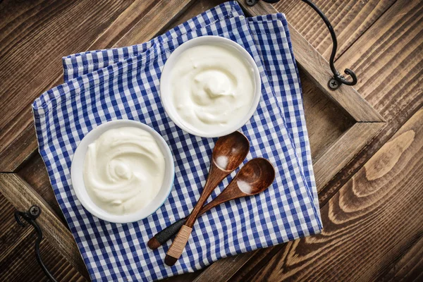 Greek yogurt in bowls — Stock Photo, Image