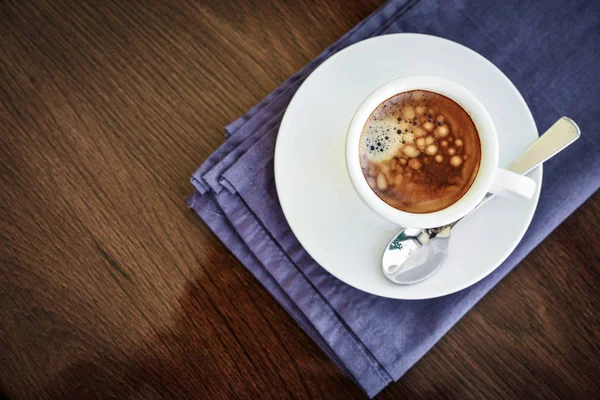 Espresso coffee in small white cup — Stock Photo, Image