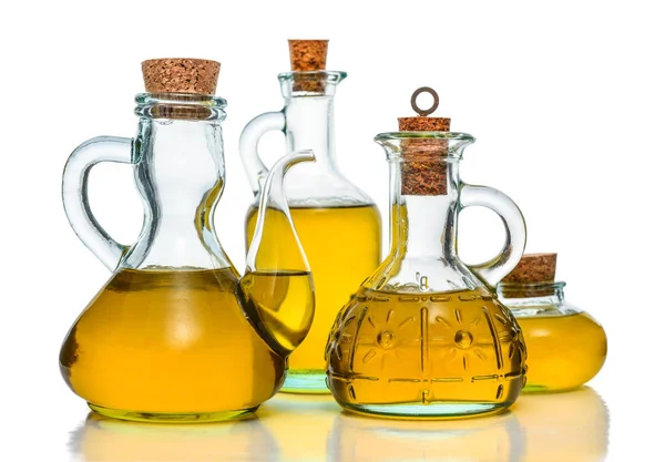 Olive oil in different bottles — Stock Photo, Image