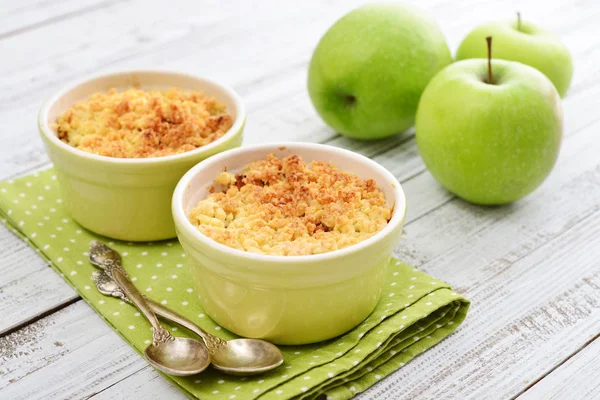 Apple crumble in small baking dish — Stock Photo, Image