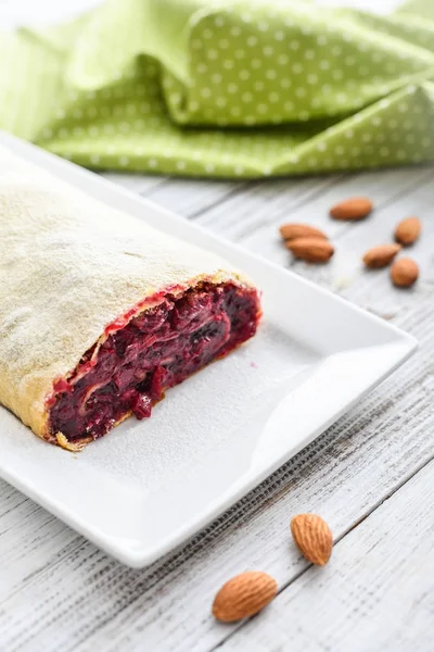 Cherry Strudel Almond Powdered Sugar Wooden Background — Stock Photo, Image