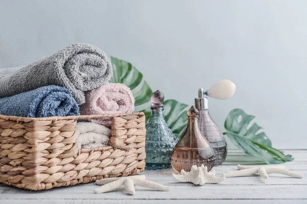 Vintage bottles with towels — Stock Photo, Image