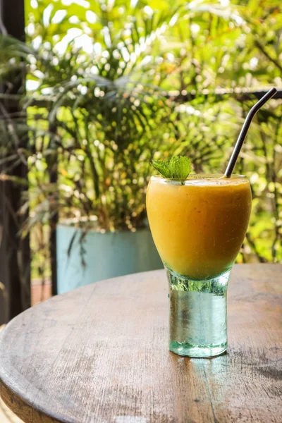 Mango juice in glass — Stock Photo, Image