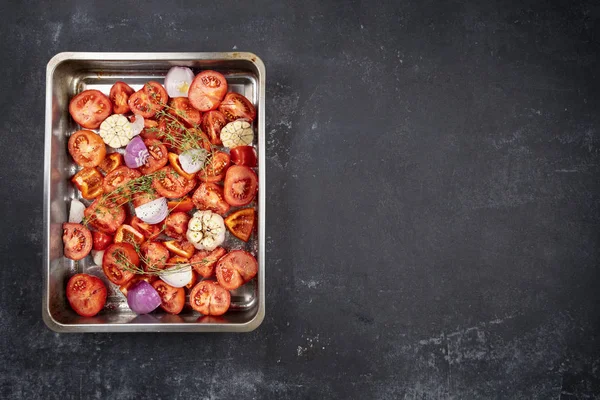 Ready for roasting vegetables as a main ingredient for tomato so — Stock Photo, Image