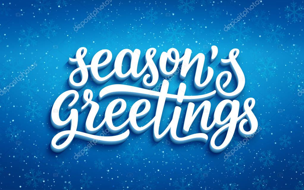 Seasons greetings lettering on blue background