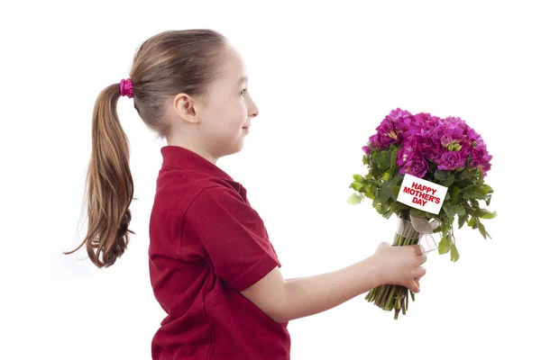 Little girl holding a bouquet — Stock Photo, Image