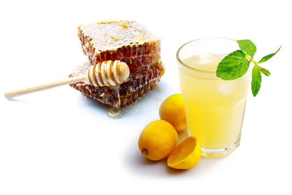 Honeycomb and lemonade — Stock Photo, Image