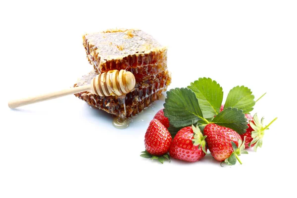 Strawberries and honeycomb — Stock Photo, Image