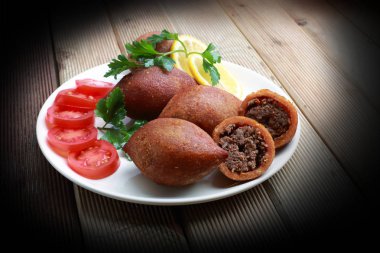 Kibbeh is a popular dish in Middle Eastern cuisine clipart