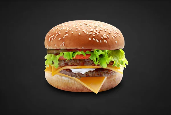 Grote cheeseburger geïsoleerd op witte achtergrond — Stockfoto