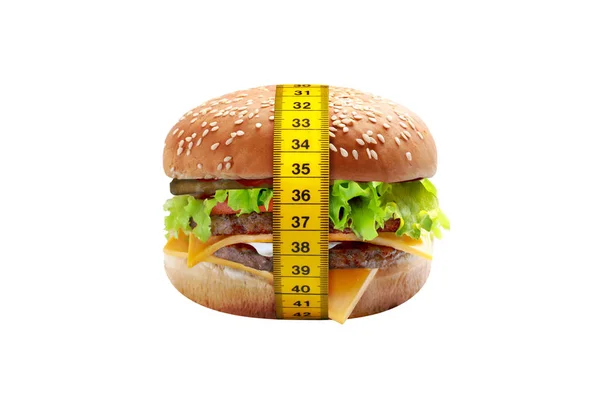 Big cheeseburger with meter diet concept — Stock Photo, Image