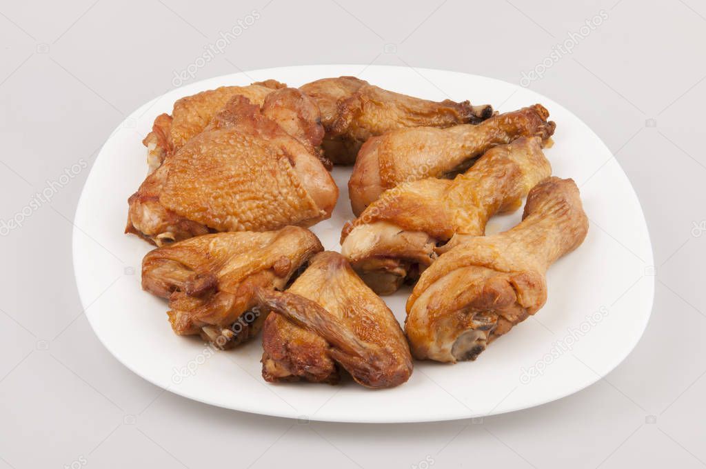 chicken grilled on the white plate