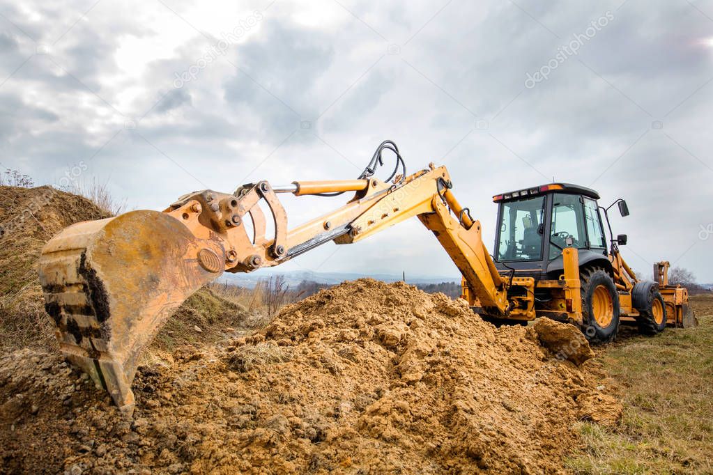 Excavator doing earthworks on site