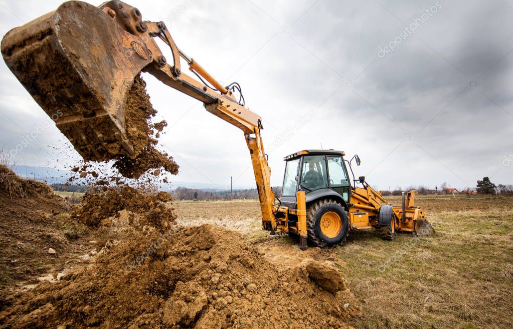 Excavator doing earthworks on site