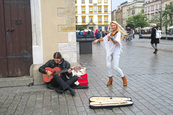 Músicos de calle en Cracovia — Foto de Stock