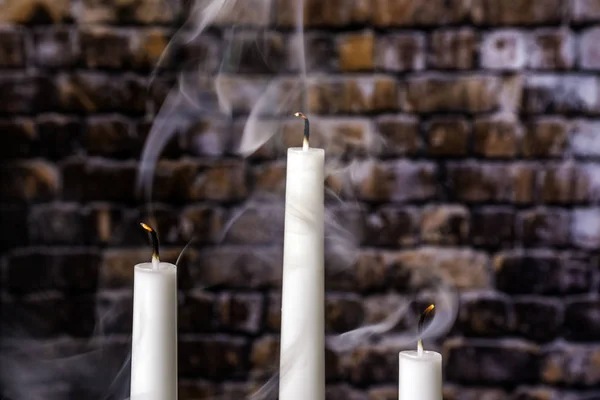 Drei glühende Kerzen — Stockfoto