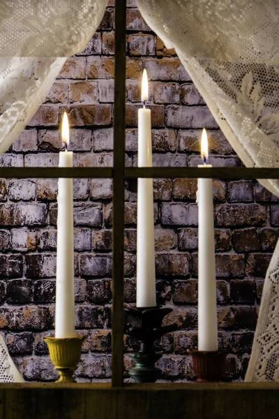 Three Candles in Window