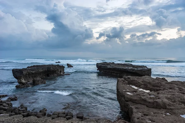 Coastline with rocks and stones. Bali. Indonesia.