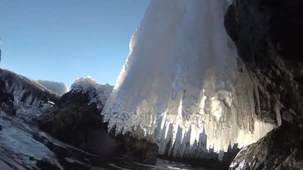Icicles on the coastal rocks in the Black Sea — Stock Video