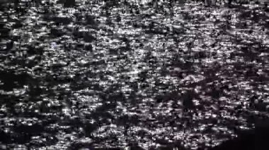 Sudaki güneş parlaması, Karadeniz 'deki güneş lekeleri, Ukrayna, Odessa' daki.