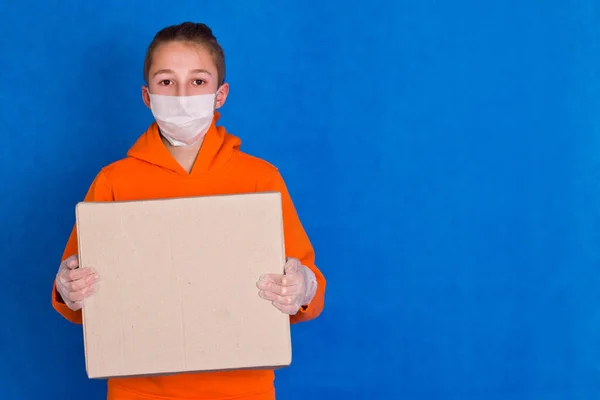 Face Gloves Delivery Worker Mask Holding Blank Cartboard Box Blue — Stock Fotó