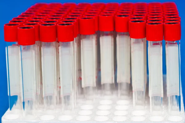 Close Blank Laboratory Test Tubes Red Caps Ready Use Stock Photo