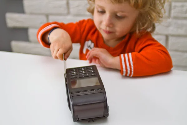 Little Boy Long Curly Hair Makes Card Payment Terminal — Stock Photo, Image