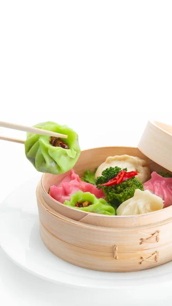 Multi-colored chinese steamed dumplings Dim Sums