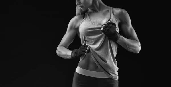 Attractive young sports woman posing in sportswear — Stock Photo, Image