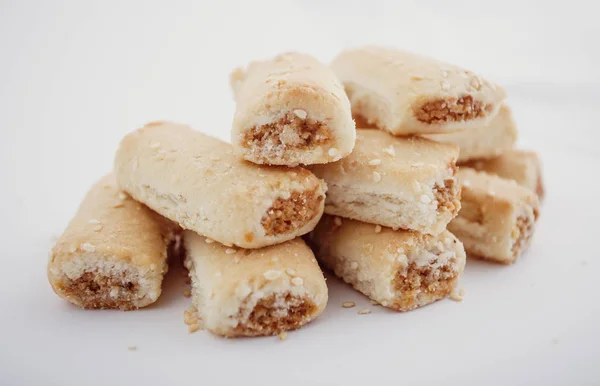 Arabian Eid dates sweets isolated. Oriental sweets with honey and nuts. Turkish Pakhlava Isolated On White. Turkish dessert.