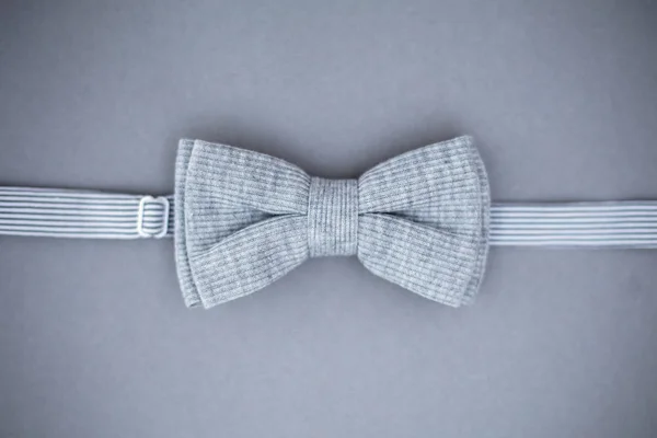 Stylish bowtie soft cloth ribbon.  Classic groom accessories. Set of men's stylish vintage. Male decoration for couple. Jewelry for man. Groom's morning. Accessory for formal dress. Symbol of elegance and fashion for men. — Stock Photo, Image