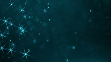 Yıldız gece gökten iner. Küçük parlak renkli parçacıklar yavaş yavaş ve düzensizce sihirli bir atmosfer yaratarak havada uçmak. Ağır çekim 240 fps hızında