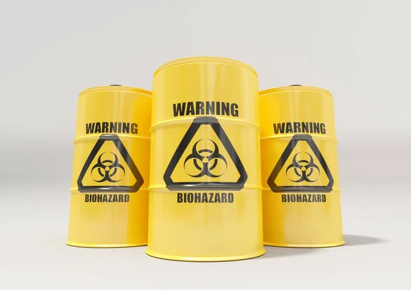 Gelbe Metallfässer mit schwarzem Biohazard-Warnschild Stockbild