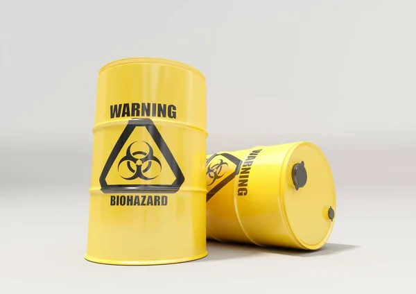 Gelbe Metallfässer mit schwarzem Biohazard-Warnschild lizenzfreie Stockbilder