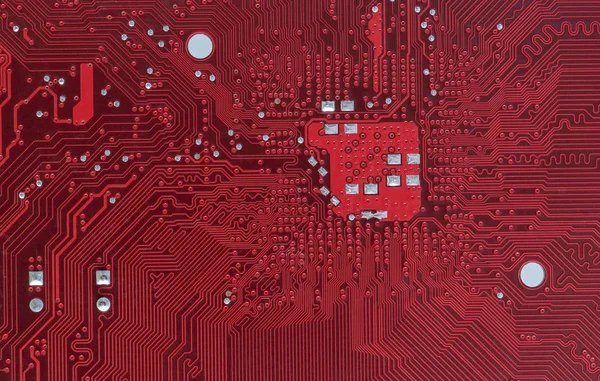 Macro de hardware van het moederbord van de computer van het detail in het rood — Stockfoto