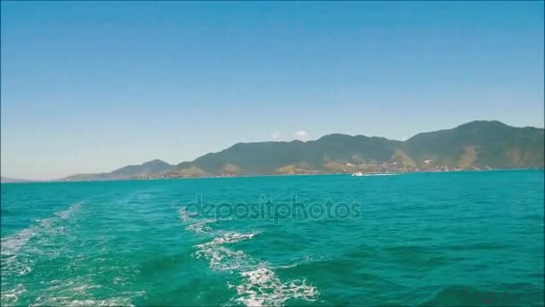 Boat sailing near the island coast line — Stock Video