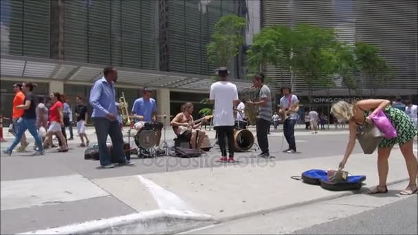 Group of street musicians playing at street — Stock Video