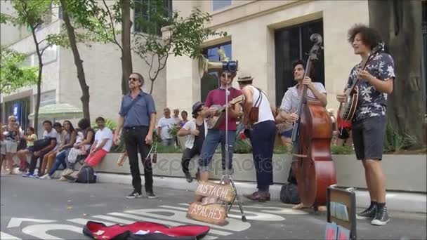 Group of street musicians playing at street — Stock Video