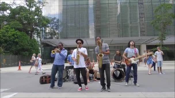 Group of street musicians playing at street — Stock Video