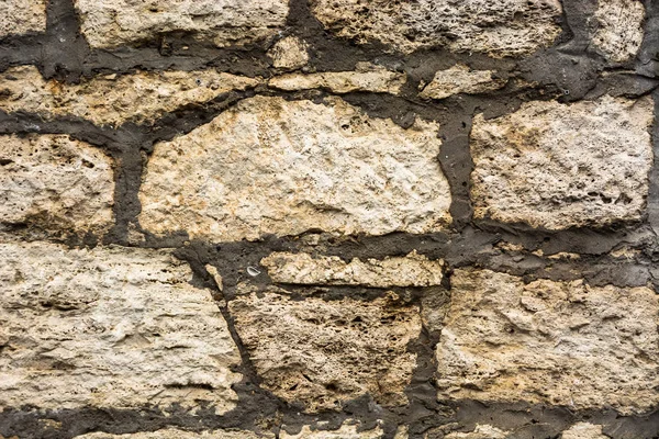 Antecedentes Una Pared Hecha Piedras Varias Formas Tamaños — Foto de Stock