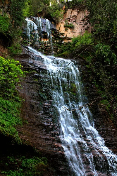 Waterfall.   Mountain waterfall, located in the mountains of Kyrgyzstan. Issyk Kul