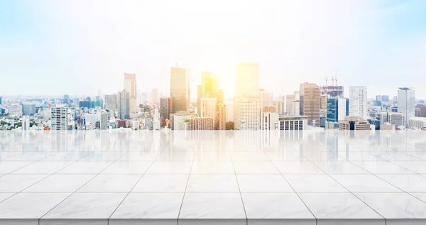 Business concept - Empty marble floor top with panoramic modern cityscape building bird eye aerial view under sunrise and morning blue bright sky of Tokyo, Japan for display or montage product