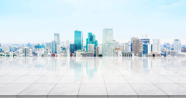 Business concept - Empty marble floor top with panoramic modern cityscape building bird eye aerial view under sunrise and morning blue bright sky of Tokyo, Japan for display or montage product