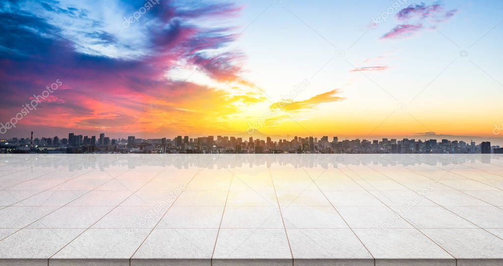 Business concept - Empty marble floor top with panoramic modern cityscape building bird eye aerial view under sunrise and morning blue bright sky of fuji mount in Tokyo, Japan for display or montage product