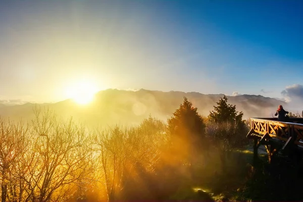 Beautiful morning sunrise, dramatic cloud of sea and Yushan mounatin under bright blue sky in Alishan(Ali mountain) National Park, Taiwan