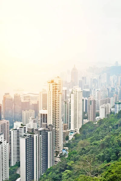 Business concept for real estate and corporate construction - panoramic modern city skyline bird eye aerial view with dramatic sunrise and morning blue sky in Hong Kong (HK), China
