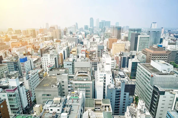 İş kavramı - sarmal kule ve dramatik gündoğumu ve Nagoya Tv Kulesi Nagoya, Japonya üzerinde sabah mavi gökyüzü altında midland Meydanı panoramik modern şehir manzarası kuş gözü havadan görünümü — Stok fotoğraf